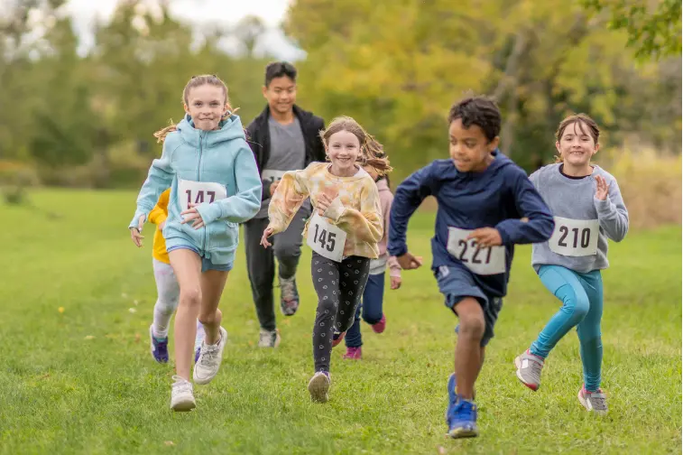 Children taking part in a school fun run fundraiser